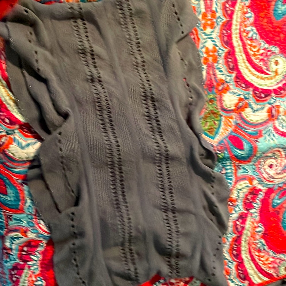 Gray infinity scarf with silver detail on edge